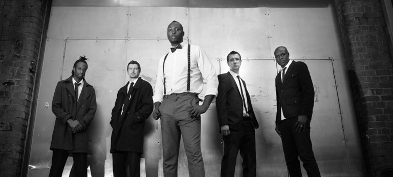 Soul band Checkmate pose for photo in Leeds Wedding Musicians