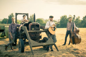 Sons of men folk band with tractor