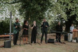 Eclectic Harmony Gospel Choir performing at outdoor wedding